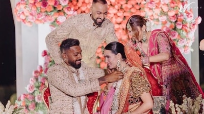 Cricketer Krunal Pandya and his wife Pankhuri Sharma also took part in the rituals during Hardik Pandya and Natasa Stankovic's Hindu ceremony. Here Hardik is seen putting the mangalsutra around Natasa's neck. Cricketer Krunal Pandya and his wife Pankhuri Sharma also took part in the rituals during Hardik Pandya and Natasa Stankovic's Hindu ceremony. Here Hardik is seen putting the mangalsutra around Natasa's neck. 