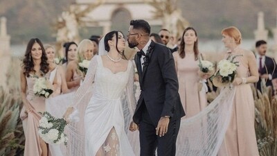 Hardik Pandya decked up in a black suit and Natasa Stankovic turned a Christian bride in a white lace gown for the Christian ceremony. The couple danced their way down the aisle. Hardik Pandya decked up in a black suit and Natasa Stankovic turned a Christian bride in a white lace gown for the Christian ceremony. The couple danced their way down the aisle. 