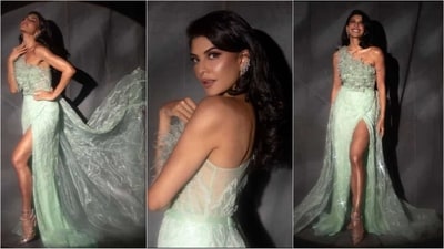 Jacqueline Fernandez is known for her exceptional sense of style and ability to look stunning in any outfit, from a sexy mini dress to an elegant evening gown. Recently, she shared some pictures of herself wearing a tea-green gown with a thigh-high slit, and her poses for the camera were truly breathtaking. Her pictures went viral on the internet, leaving her fans in awe of her beauty and fashion sense. Keep scrolling to take a look at her stunning photos. (Instagram/@jacquelinef143) Jacqueline Fernandez is known for her exceptional sense of style and ability to look stunning in any outfit, from a sexy mini dress to an elegant evening gown. Recently, she shared some pictures of herself wearing a tea-green gown with a thigh-high slit, and her poses for the camera were truly breathtaking. Her pictures went viral on the internet, leaving her fans in awe of her beauty and fashion sense. Keep scrolling to take a look at her stunning photos. (Instagram/@jacquelinef143)