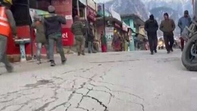 With the Kedarnath Temple Committee announcing the dates for opening doors of Shri Kedarnath Dham, cracks have been found on a stretch of road along the Badrinath Highway near Joshimath between JP and Marwari. (ANI)