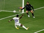 Vinicius Jr scores in the UCL final last year.