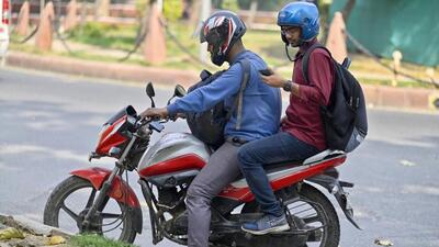 A man books an UberMoto ride in Connaught Place in New Delhi on Monday. The Delhi transport department hasissued challans to 25 bike-taxi drivers till Tuesday. (Raj K Raj/HT Photo) A man books an UberMoto ride in Connaught Place in New Delhi on Monday. The Delhi transport department hasissued challans to 25 bike-taxi drivers till Tuesday. (Raj K Raj/HT Photo)