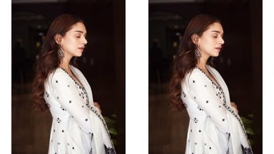 Aditi styled the outfit with jhumkis, embroidered juttis, a dainty bindi, centre-parted open tresses, rings, fuchsia pink lip shade, subtle eye shadow, mascara-adorned lashes, feathered brows, and glowing blushed skin. (Instagram) Aditi styled the outfit with jhumkis, embroidered juttis, a dainty bindi, centre-parted open tresses, rings, fuchsia pink lip shade, subtle eye shadow, mascara-adorned lashes, feathered brows, and glowing blushed skin. (Instagram)