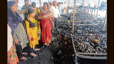 Fire broke out at a vegetable market in Handewadi Road,Hadapsar in Pune, India, on Tuesday. (SHANKAR NARAYAN)
