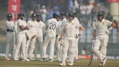 Australia's Marnus Labuschagne, right, and Steve Smith, second right, wait for the third umpire's decision (AP) Australia's Marnus Labuschagne, right, and Steve Smith, second right, wait for the third umpire's decision (AP)