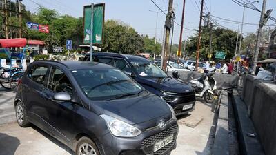 Noida, India- February 21, 2023: Surface parking at sector 29.The Noida authority has initiated an inquiry into the allegations of corruption in awarding the tender of surface parking lots in the city, in Noida, India, on Tuesday, February 21, 2023. (Photo by Sunil Ghosh / Hindustan Times) Noida, India- February 21, 2023: Surface parking at sector 29.The Noida authority has initiated an inquiry into the allegations of corruption in awarding the tender of surface parking lots in the city, in Noida, India, on Tuesday, February 21, 2023. (Photo by Sunil Ghosh / Hindustan Times)