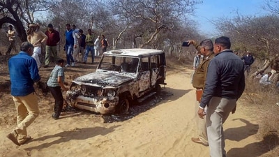**EDS, VIDEOGRAB** Bhiwani: Charred remains of a vehicle where bodies of two Muslim men were found, at Loharu in Bhiwani district, Haryana. Nasir and Junaid alias 'Juna', both residents of Ghatmeeka village in Bharatpur district of Rajasthan, were allegedly abducted on Wednesday and their bodies were found on Thursday morning. (PTI Photo)(PTI02_17_2023_000250A) (PTI)
