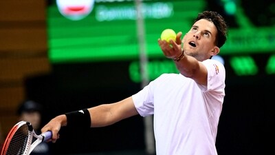 Austria's Dominic Thiem serves against Croatia's Borna Coric during their Davis Cup qualifying tennis match between Croatia and Austria, in Rijeka on February 5, 2023. (Photo by Denis LOVROVIC / AFP) (AFP)