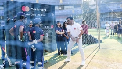 MS Dhoni interacting with young cricketers