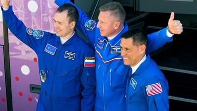 NASA astronaut Frank Rubio, right, Roscosmos cosmonauts Sergey Prokopyev, center, and Dmitri Petelin - members of the main crew to the International Space Station (ISS) - greet their relatives and friends prior to the launch of Soyuz-2.1 rocket at Baikonur cosmodrome, Kazakhstan in 2022. (AP/File)