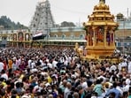  Devotees take part in the golden chariot procession of the Lord Venkateswara temple on the occasion of Vaikuntha Ekadasi, at Tirumala in Tirupati. (File/PTI)