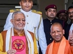 Uttar Pradesh Chief Minister Yogi Adityanath with Finance Minister Suresh Kumar Khanna before presentation of the State Budget 2023-24 in the Assembly in Lucknow, Wednesday, (PTI) Uttar Pradesh Chief Minister Yogi Adityanath with Finance Minister Suresh Kumar Khanna before presentation of the State Budget 2023-24 in the Assembly in Lucknow, Wednesday, (PTI)
