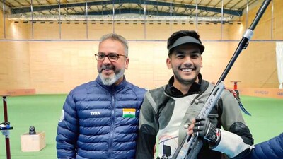Aishwary Tomar with India coach Joydeep Karmakar Aishwary Tomar with India coach Joydeep Karmakar