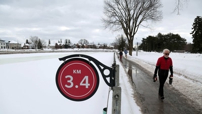 Pedestrians walk along the the Rideau Canal in Ottawa, Canada. This winter has brought wild and unseasonably warm weather to Canada's capital, raising the prospect that its Rideau Canal skateway -- the longest in the world -- will not open this season for the first time, due to a lack of ice. According to Environment Canada, Ottawa is in the grips of its third-warmest winter ever recorded, with temperatures hovering just below freezing through most of December and January. (Photo by Dave Chan / AFP) Pedestrians walk along the the Rideau Canal in Ottawa, Canada. This winter has brought wild and unseasonably warm weather to Canada's capital, raising the prospect that its Rideau Canal skateway -- the longest in the world -- will not open this season for the first time, due to a lack of ice. According to Environment Canada, Ottawa is in the grips of its third-warmest winter ever recorded, with temperatures hovering just below freezing through most of December and January. (Photo by Dave Chan / AFP)
