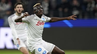 Napoli's Victor Osimhen reacts during the Champions League round of 16 second leg soccer match between Eintracht Frankfurt and Napoli, at the Deutsche Bank Arena in Frankfurt, Germany, Tuesday, Feb. 21, 2023. (AP Photo/Michael Probst) (AP) Napoli's Victor Osimhen reacts during the Champions League round of 16 second leg soccer match between Eintracht Frankfurt and Napoli, at the Deutsche Bank Arena in Frankfurt, Germany, Tuesday, Feb. 21, 2023. (AP Photo/Michael Probst) (AP)