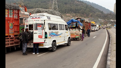 Vehicular movement remains suspended between Jammu-Srinagar highway as landslide blocks National Highway-44, in Udhampur on Wednesday. (ANI)
