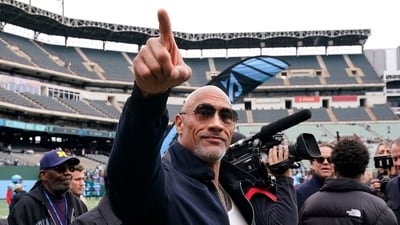 XFL owner Dwayne Johnson gestures to the crowd before the game between the Arlington Renegades and the Vegas Vipers at Choctaw Stadium. (Getty Images via AFP) XFL owner Dwayne Johnson gestures to the crowd before the game between the Arlington Renegades and the Vegas Vipers at Choctaw Stadium. (Getty Images via AFP)