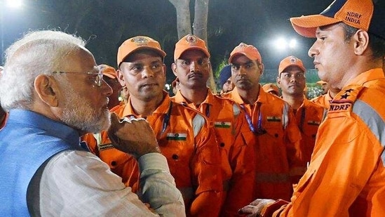 Prime Minister Narendra Modi interacts with NDRF personnel involved in ‘Operation Dost’ in Türkiye and Syria, in New Delhi on Monday. (ANI)