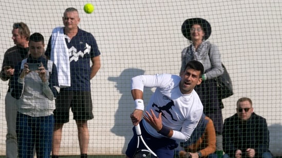 Serbian tennis player Novak Djokovic serves the ball during his open practise session in Belgrade (AP)