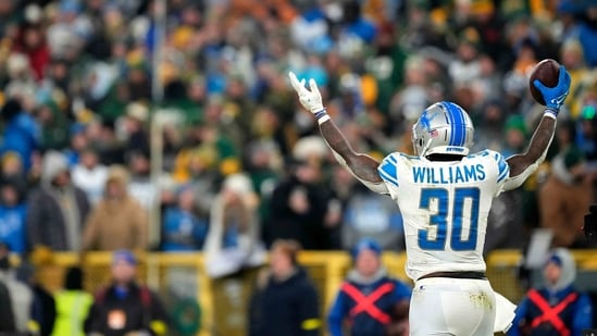 Jamaal Williams #30 of the Detroit Lions celebrates after scoring a touchdown. (Getty Images via AFP)
