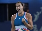 Aryna Sabalenka reacts after she got a point against Latvia's Jeļena Ostapenko during a match of the Dubai Duty Free Tennis Championships in Dubai, United Arab Emirates, Wednesday, Feb 22, 2023. (AP Photo/Kamran Jebreili)
