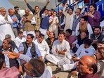 **EDS: SCREENSHOT VIA AICC** New Delhi: Congress leaders stage a protest dharna at the IGI Airport after the party leader Pawan Khera was allegedly deboarded from the plane owing to an FIR against him, in New Delhi, Thursday, Feb. 23, 2023. (PTI Photo) (PTI02_23_2023_000039B)
