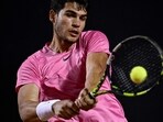 Spain's Carlos Alcaraz returns the ball during the ATP 500 Rio Open singles tennis match against Brazil's Mateus Alves in Rio de Janeiro, Brazil, on February 21, 2023. (Photo by MAURO PIMENTEL / AFP)