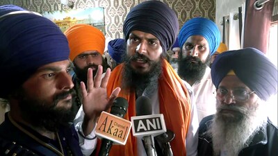 'Waris Punjab De' chief Amritpal Singh speaks to media after his supporters break barricades and enter the police station demanding the release of Amritpal Singh's close aide in Ajnala near Amritsar on Thursday. (ANI Pic Service)