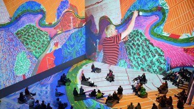 The exhibit grew out of an email Slaney sent Hockney back in 2019 suggesting a collaboration. "Maybe we thought we'd get some interviews and a little bit of time. In fact we've been back and forth to his house in Normandy over the past three years... and he's been in the room with us for the last three months every day," he told AFP. (Daniel Leal / AFP) The exhibit grew out of an email Slaney sent Hockney back in 2019 suggesting a collaboration. "Maybe we thought we'd get some interviews and a little bit of time. In fact we've been back and forth to his house in Normandy over the past three years... and he's been in the room with us for the last three months every day," he told AFP. (Daniel Leal / AFP)
