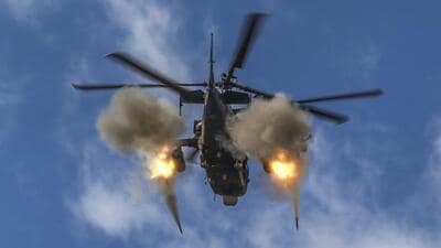 A Russian Ka-52 helicopter gunship fires at a target in an unknown location in Ukraine. As Russia’s invasion of Ukraine enters its second year, both sides hope to turn the tide of war with big offensives. (AP) A Russian Ka-52 helicopter gunship fires at a target in an unknown location in Ukraine. As Russia’s invasion of Ukraine enters its second year, both sides hope to turn the tide of war with big offensives. (AP)