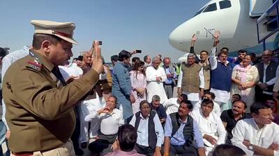 Congress leaders staged a protest at the Delhi airport after the police deplaned and detained party leader Pawan Khera on Thursday. (AICC)