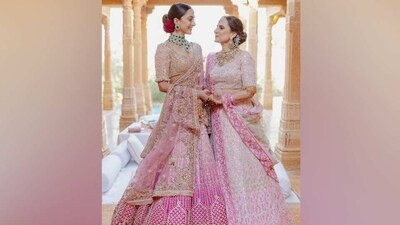 In the photo, Kiara and her mother look lovingly at each other before the actor tied the knot with Sidharth Malhotra. While Kiara wore a pink, gold and beige heavily-embellished lehenga set with emerald and diamond-adorned jewels for her wedding, her mother complemented her in a matching lehenga set. (Instagram) In the photo, Kiara and her mother look lovingly at each other before the actor tied the knot with Sidharth Malhotra. While Kiara wore a pink, gold and beige heavily-embellished lehenga set with emerald and diamond-adorned jewels for her wedding, her mother complemented her in a matching lehenga set. (Instagram)