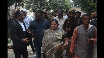 SP MLA from Pratappur Vijma Yadav leaving MP/MLA court after being granted bail within minutes of being convicted in a 22-year-old case of rioting, in Prayagraj on Thursday. (HT photo)