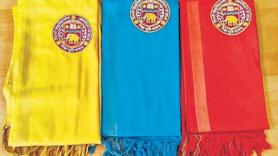 Students completing their undergraduate degree will wear a yellow angavastra, post-graduate students will wear turquoise, and PhD scholars will don red stoles, according to university officials. The rest of the clothes can be of their choosing. (HT Photo) Students completing their undergraduate degree will wear a yellow angavastra, post-graduate students will wear turquoise, and PhD scholars will don red stoles, according to university officials. The rest of the clothes can be of their choosing. (HT Photo)