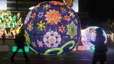 People walk past lanterns during the Lantern Festival, marking the end of the Chinese lunar New Year celebrations, in Taipei, Taiwan. Taiwan aims to boost travel industry, will give tourists perks worth $165 each (AP Photo/Chiang Ying-ying) People walk past lanterns during the Lantern Festival, marking the end of the Chinese lunar New Year celebrations, in Taipei, Taiwan. Taiwan aims to boost travel industry, will give tourists perks worth $165 each (AP Photo/Chiang Ying-ying)