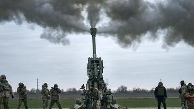 Ukrainian soldiers fire at Russian positions from a howitzer in Ukraine’s Kherson region. (AP) Ukrainian soldiers fire at Russian positions from a howitzer in Ukraine’s Kherson region. (AP)