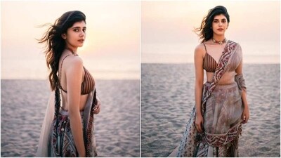 Sanjana Sanghi is an absolute fashionista. The actor keeps slaying fashion goals like a pro with snippets from her fashion diaries on her Instagram profile on a regular basis. From decking up in casual ensembles to showing us how to look stunning in festive attires, Sanjana keeps giving us all kinds of fashion goals. A day back, Sanjana looked ravishing by the sea as she attended one of her friends’ wedding ceremony. (Instagram/@sanjanasanghi96) Sanjana Sanghi is an absolute fashionista. The actor keeps slaying fashion goals like a pro with snippets from her fashion diaries on her Instagram profile on a regular basis. From decking up in casual ensembles to showing us how to look stunning in festive attires, Sanjana keeps giving us all kinds of fashion goals. A day back, Sanjana looked ravishing by the sea as she attended one of her friends’ wedding ceremony. (Instagram/@sanjanasanghi96)