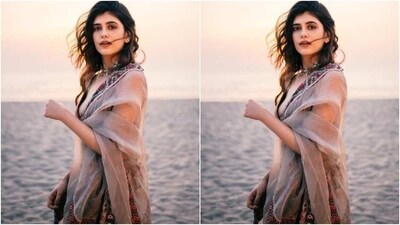 Styled by fashion stylist Priyankka Castelinno, Sanjana wore her tresses open in wavy curls as she posed for the pictures with the backdrop of the sea. (Instagram/@sanjanasanghi96) Styled by fashion stylist Priyankka Castelinno, Sanjana wore her tresses open in wavy curls as she posed for the pictures with the backdrop of the sea. (Instagram/@sanjanasanghi96)
