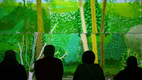 &nbsp;"The world is a very very beautiful if you look at it. Most people don't look," says Hockney in a commentary that runs through the show, along with archive recordings. Now aged 85 and still painting, Hockney fully embraced the immersive concept, said Richard Slaney, chief executive of London's new Lightroom venue which co-developed the show with the artist.&nbsp;(Daniel Leal / AFP)