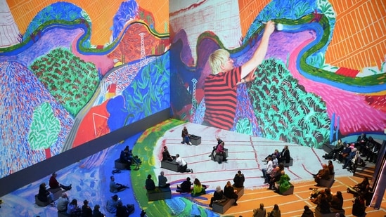 The exhibit grew out of an email Slaney sent Hockney back in 2019 suggesting a collaboration. "Maybe we thought we'd get some interviews and a little bit of time. In fact we've been back and forth to his house in Normandy over the past three years... and he's been in the room with us for the last three months every day," he told AFP. &nbsp;&nbsp;&nbsp;(Daniel Leal / AFP)