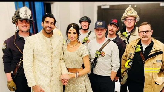 Couple misses their reception after getting stuck in an elevator. (Facebook/@Charlotte Fire Department, Charlotte NC)