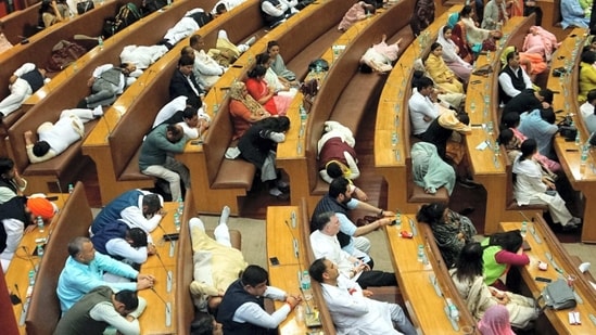 Some councillors relax while others sleep during the election of members of the standing committee at Civic Centre in New Delhi, Wednesday. (PTI)