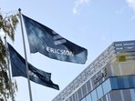 Flags with Ericsson logo are pictured outside company's head office in Stockholm, Sweden