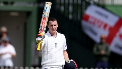 England's Harry Brook celebrates 100 runs during day one of the second cricket Test match between New Zealand and England at the Basin Reserve in Wellington on February 24, 2023. (Photo by Marty MELVILLE / AFP) (AFP)