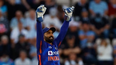 India's Dinesh Karthik celebrates taking a catch (Reuters)