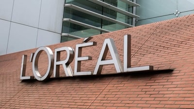 A sign for L'Oreal SA at the company's global headquarters in Paris, France. (Bloomberg)