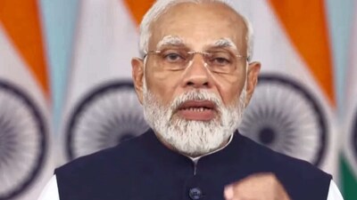 Prime Minister Narendra Modi virtually addresses the G20 Finance Ministers' and Central Bank Governors' meeting being held in Bengaluru, Friday. (PTI) Prime Minister Narendra Modi virtually addresses the G20 Finance Ministers' and Central Bank Governors' meeting being held in Bengaluru, Friday. (PTI)