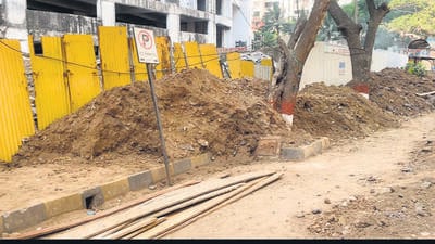 The matter first came to light after local MLA Mihir Kotecha alerted BMC’s sewerage department on Thursday about the shoddy work done by the contractor, who had left the soil and debris, from excavation, on the road for over a month “leading to the poor air quality in the neighbourhood” and demanded that “the contractor be booked for playing with the lives of citizens”. (HT PHOTO) The matter first came to light after local MLA Mihir Kotecha alerted BMC’s sewerage department on Thursday about the shoddy work done by the contractor, who had left the soil and debris, from excavation, on the road for over a month “leading to the poor air quality in the neighbourhood” and demanded that “the contractor be booked for playing with the lives of citizens”. (HT PHOTO)