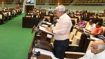 Gujarat Finance minister Kanubhai Desai presents the State Budget 2023-24 in the Assembly, in Gandhinagar, Friday. (PTI) Gujarat Finance minister Kanubhai Desai presents the State Budget 2023-24 in the Assembly, in Gandhinagar, Friday. (PTI)