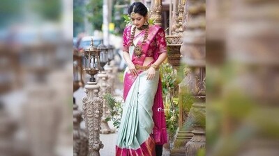 Tamilian style: This style is popular in Tamil Nadu and is known for its simplicity. The saree is draped in a way that the pallu is taken over the left shoulder and is then tucked in the waist. (Pinterest) Tamilian style: This style is popular in Tamil Nadu and is known for its simplicity. The saree is draped in a way that the pallu is taken over the left shoulder and is then tucked in the waist. (Pinterest)